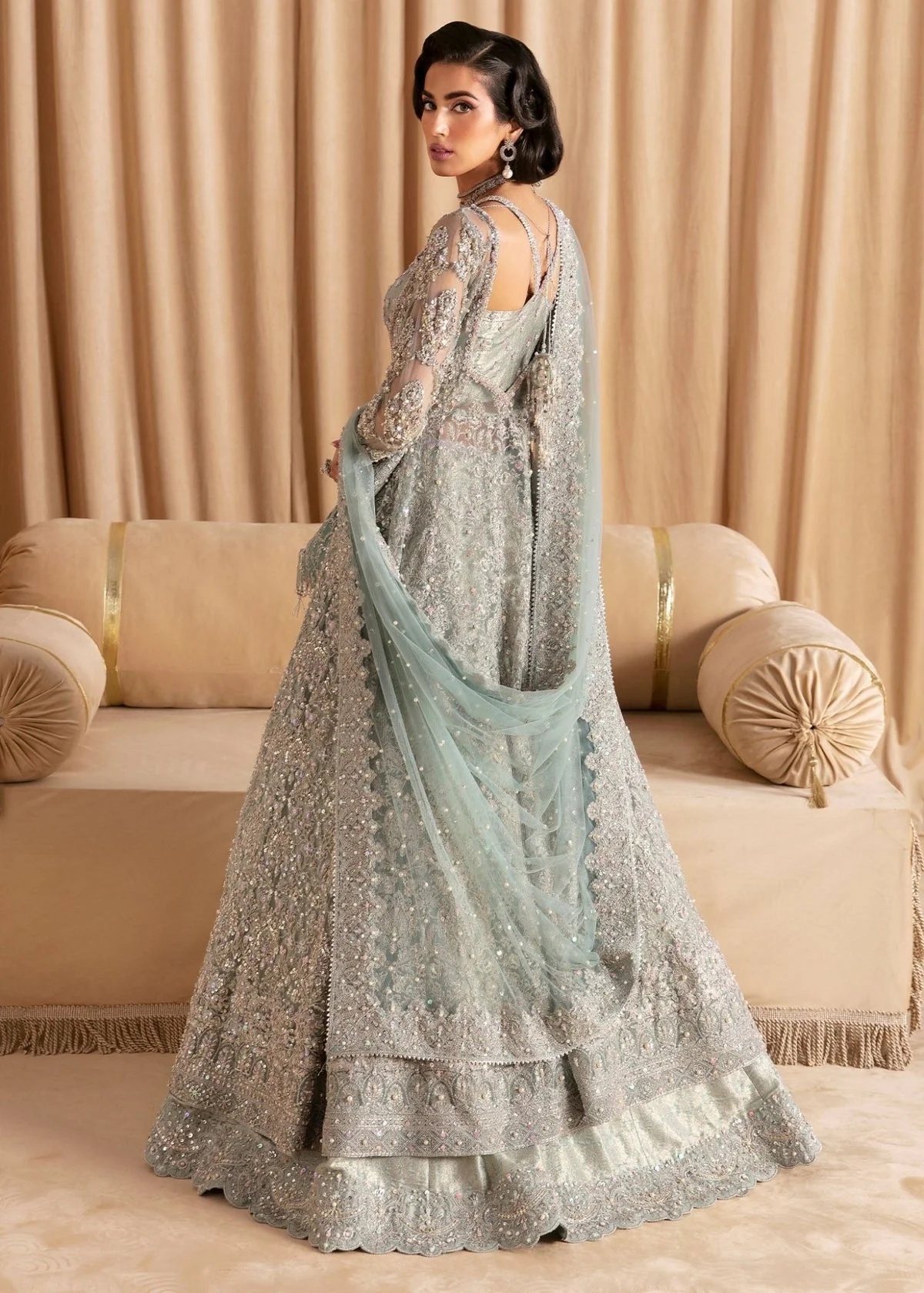 RIJA I KANWAL MALIK clothing in blue tones.